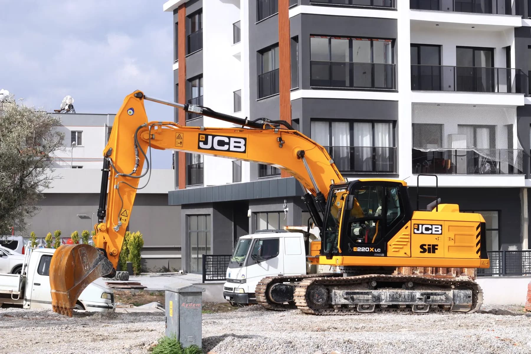 JCB graafmachine aan het werk